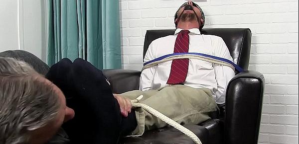  Good looking stud tied up and gagged while toe sucked